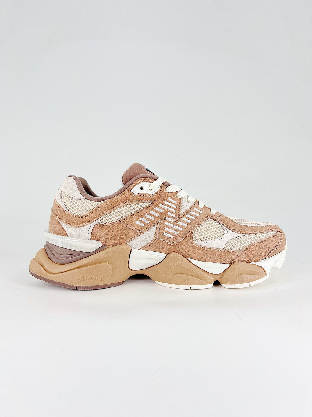 New Balance 9060 in the "Earth Shadow" or "Sparrow" colorway