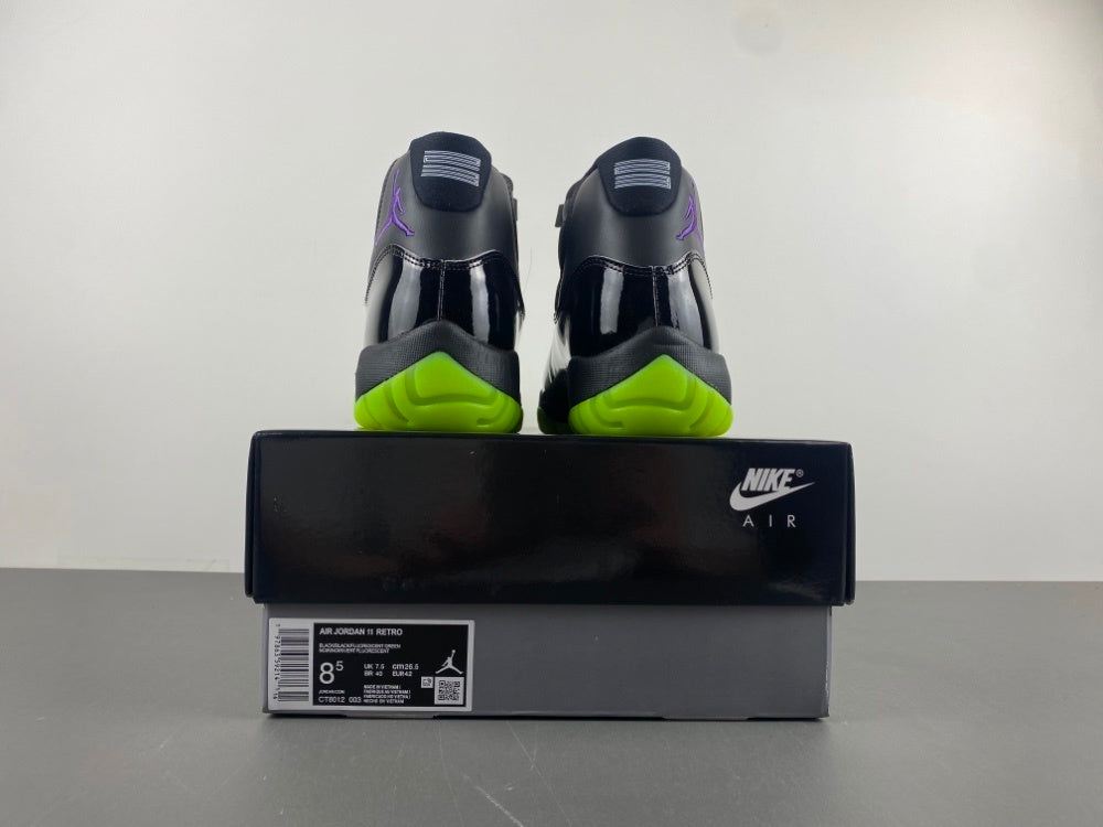 Nike Air Jordan 11 Retro in the "Black/Barely Volt" colorway
