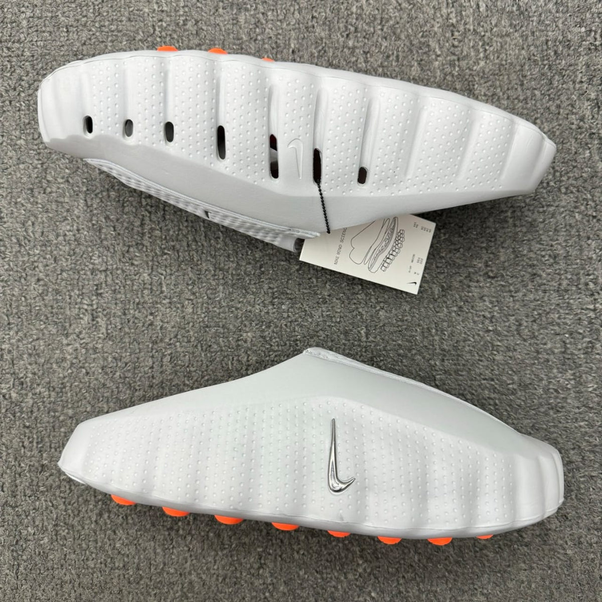 Nike Mind 001 recovery mule in the "Light Smoke Grey"