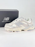 New Balance 9060 sneakers, featuring a retro-futuristic design inspired by archival models like the 990 serie